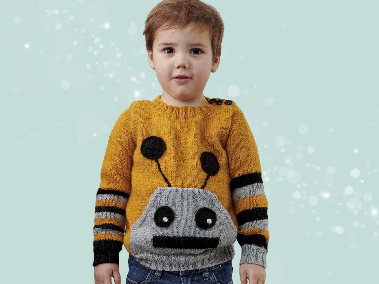 Simple hooded baby cardigan with large frog eyes on the hood. Easy construction, green hoodie knitting pattern jane burns