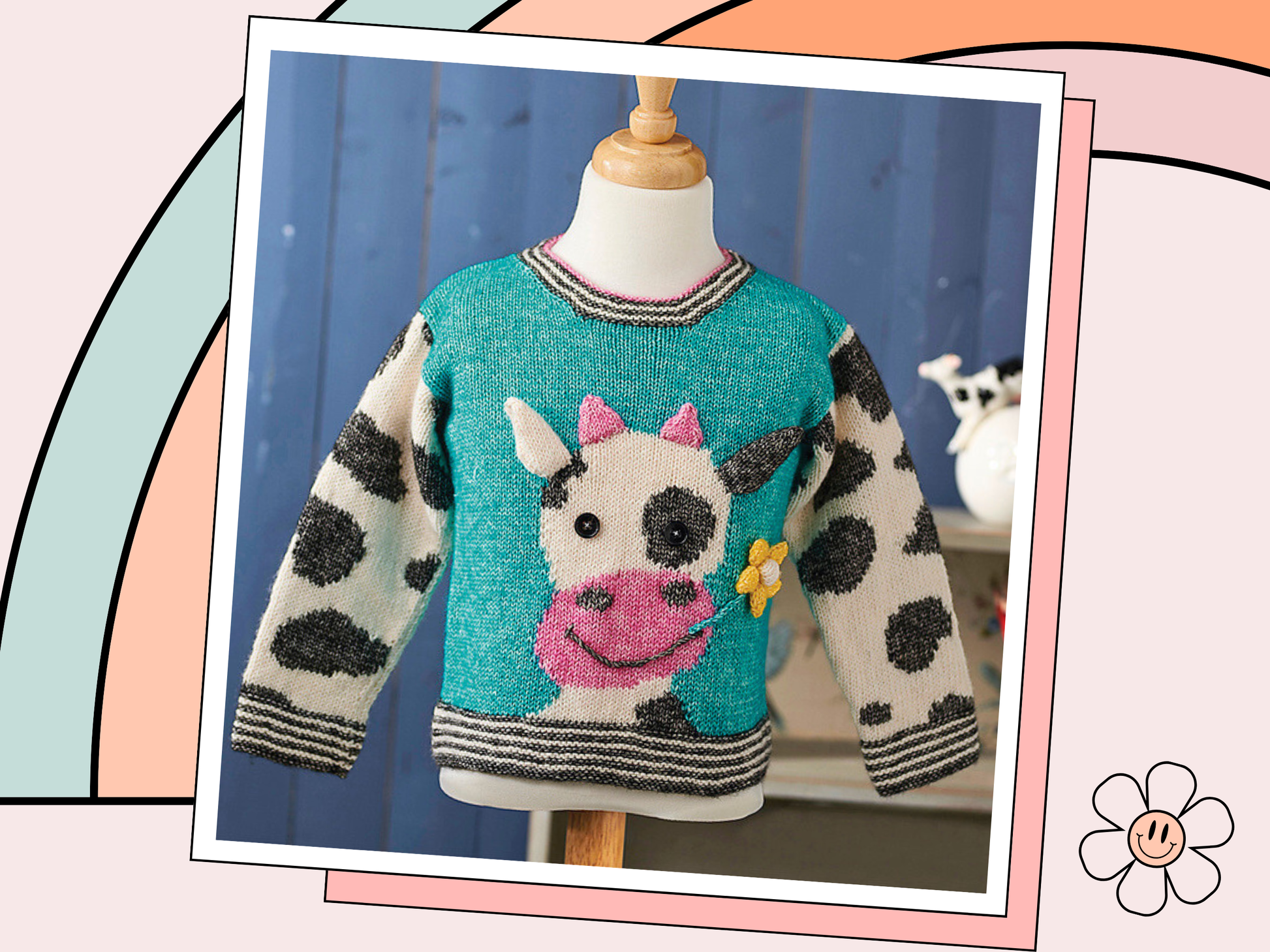 Charming kids jumper with a large cow motif, cow eating a flower. knit flower, horns and ears and sew them on. Cow print sleeve and simple garter edging. Knitting pattern by Jane Burns Daisy the Cow Sweater Knitting pattern