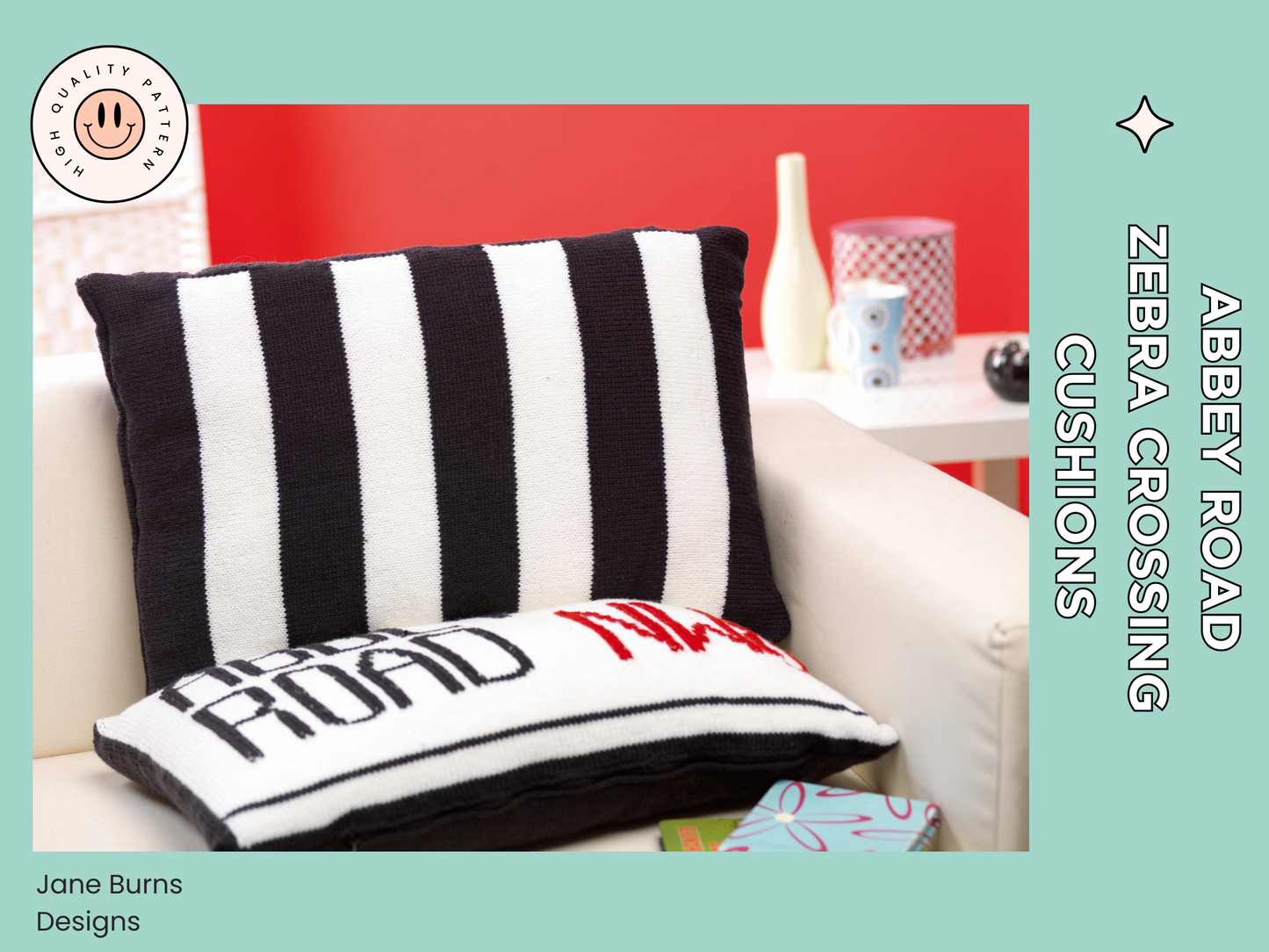 Image shows two knitted cushions one showing the abbey road street sign and behind it a second black and white striped cushion looking like the zebra crossing from the beatles music album knitting pattern by jane burns