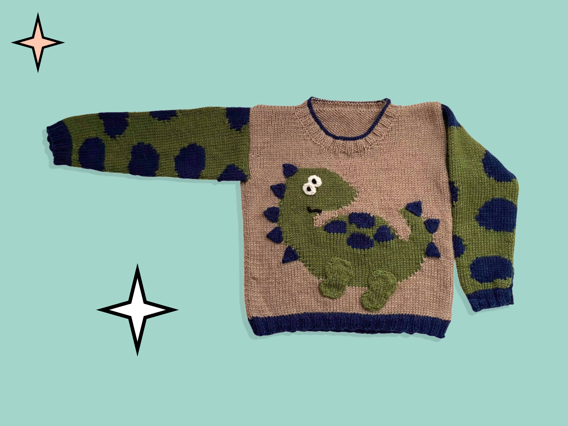 Dinosaur jumper knitting pattern, kids sweater with Dino motif and animal print sleeves. Intarsia knitting pattern for children’s jumper. Jane Burns Designs