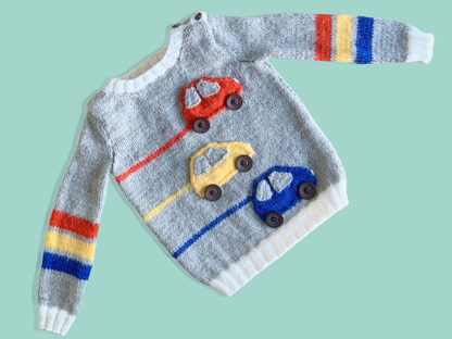Racing car, baby sweater, car sweater for baby, knitting pattern for baby jumper with cars. Jane Burns 