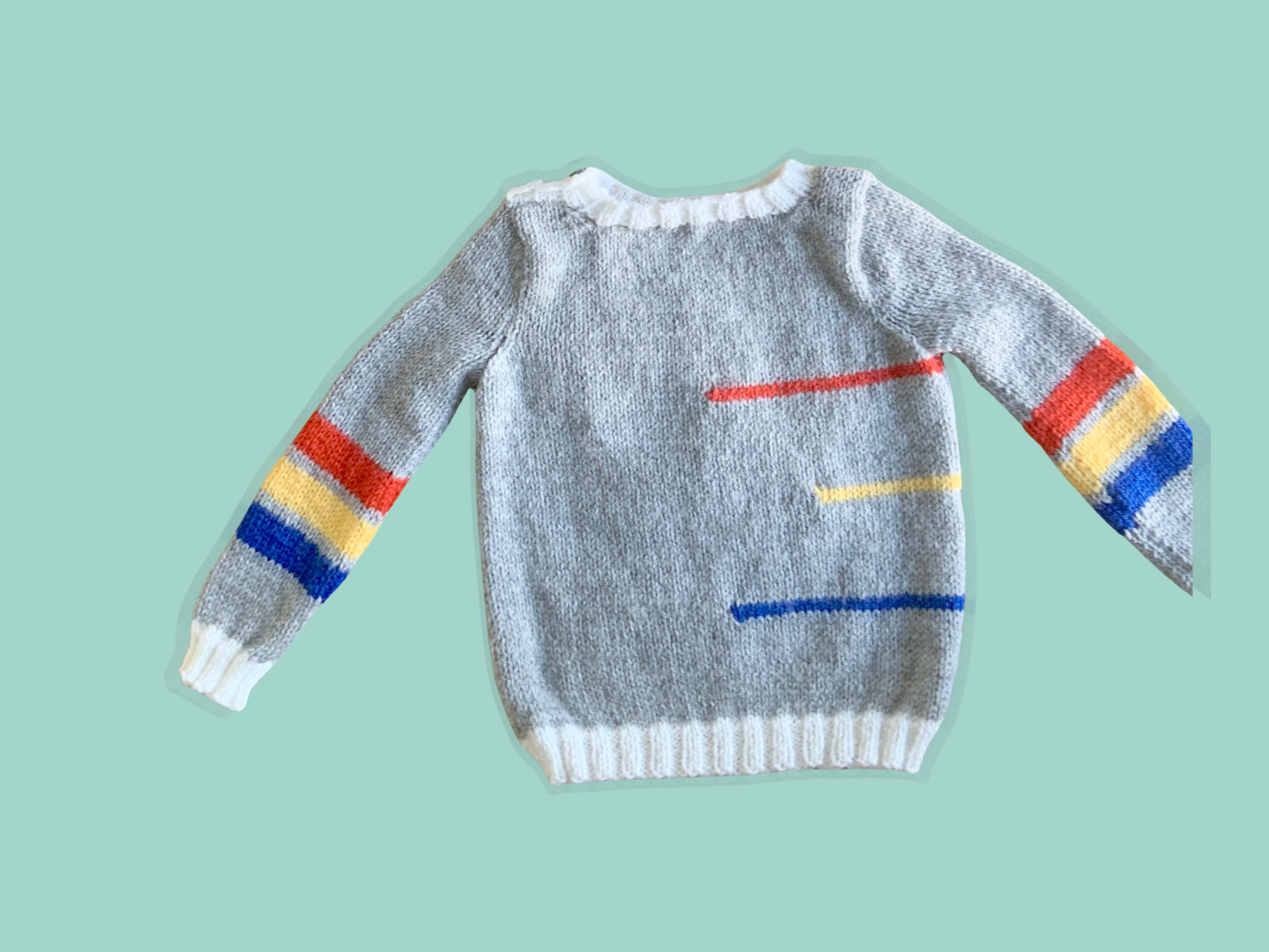 Racing car, baby sweater, car sweater for baby, knitting pattern for baby jumper with cars. Jane Burns 