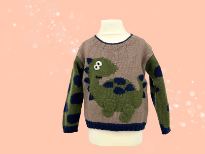 Dinosaur jumper knitting pattern, kids sweater with Dino motif and animal print sleeves. Intarsia knitting pattern for children’s jumper. Jane Burns Designs