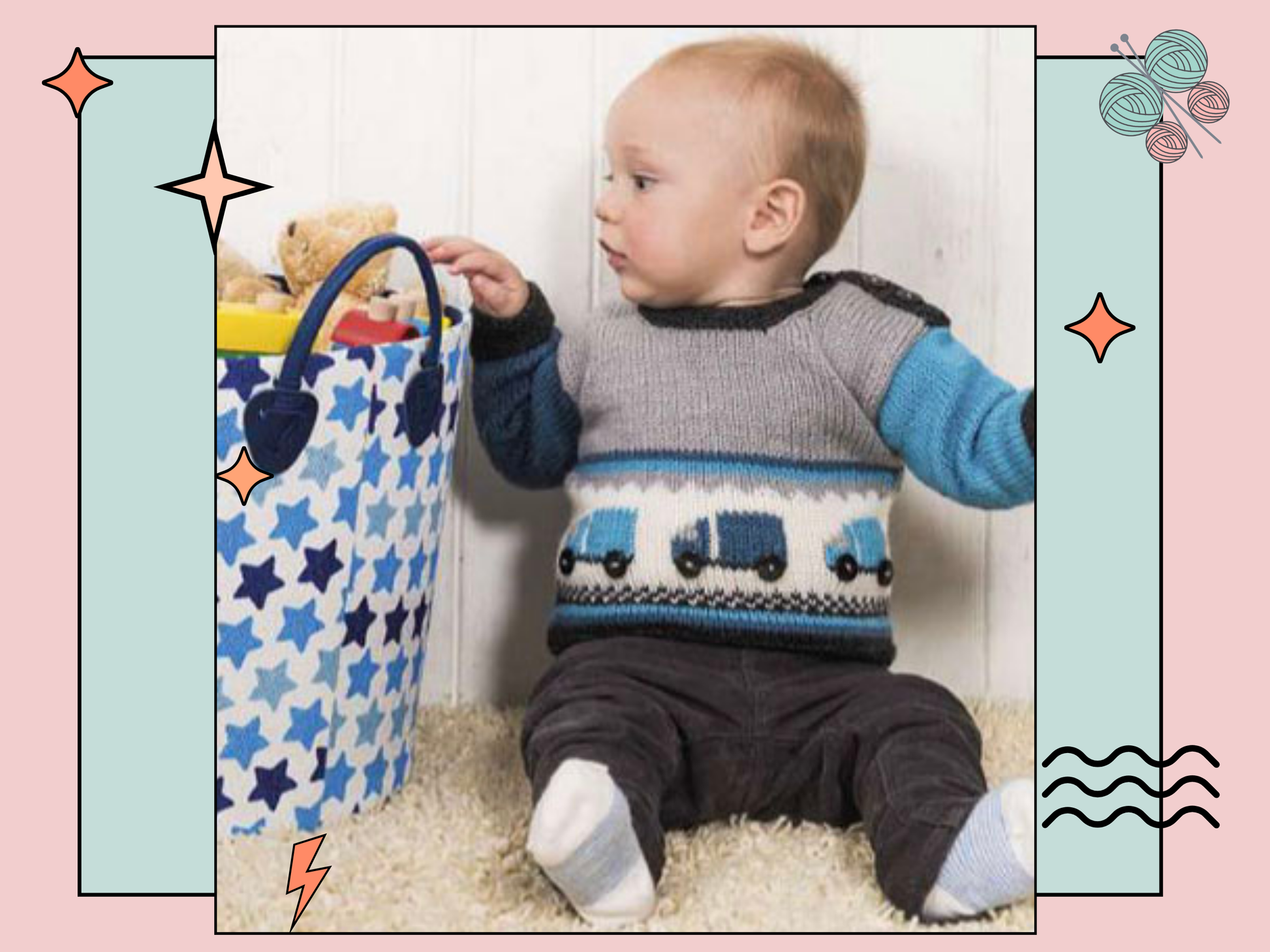 A baby sweater with button fastening either side of neck. Grey body with blue sleeves. a white panel runs across the front with intarsia lorries with button wheels, a checkboard banner and stripes finish the bottom. knitting pattern