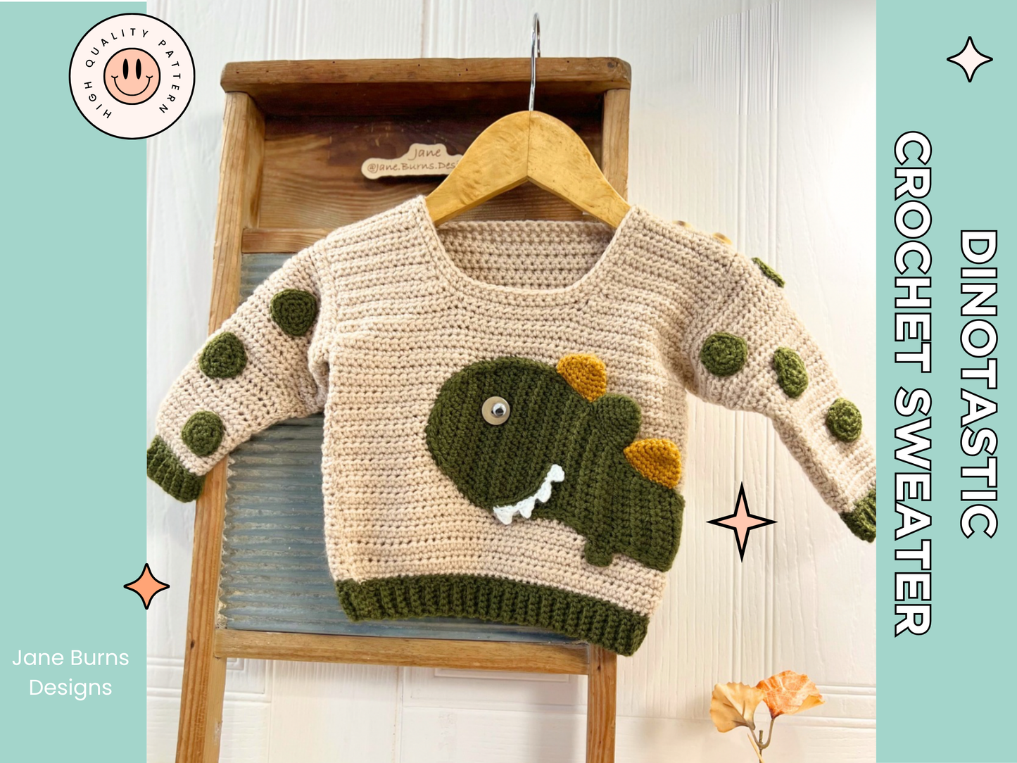 beige crochet sweater with moss green cuff, featuring a moss green dinosaur applique, mustard and moss green spikes run down the spine of the dinosaur. the dinosaur has white teeth and googly eye. the sleeves of the jumper has crochet spots sewn to them. dinotastic crochet sweater pattern for babies and toddlers by jane burns
