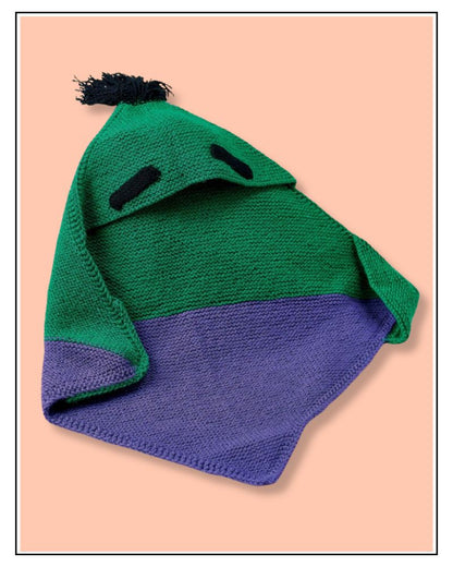 Frankenstein monster hood detail, green knitted baby blanket with black eyebrows and wild black hair
