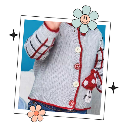 Knitted children's cardigan with red trim and mushroom design on a white background, Fun guy Mushroom cardigan knitted pattern for babies with plaid sleeves. jane burns designs