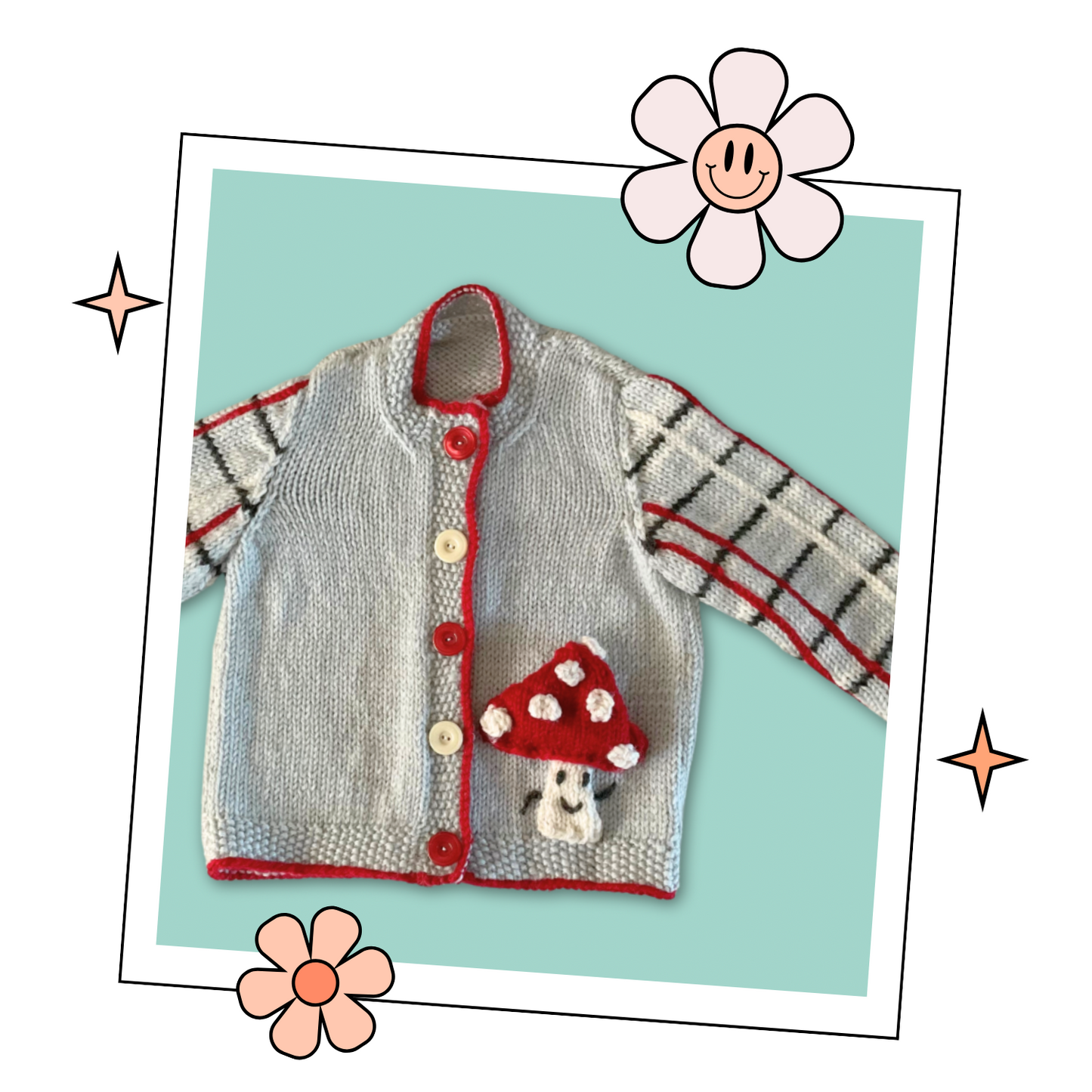 Knitted children's cardigan with red trim and mushroom design on a white background, Fun guy Mushroom cardigan knitted pattern for babies with plaid sleeves. jane burns designs