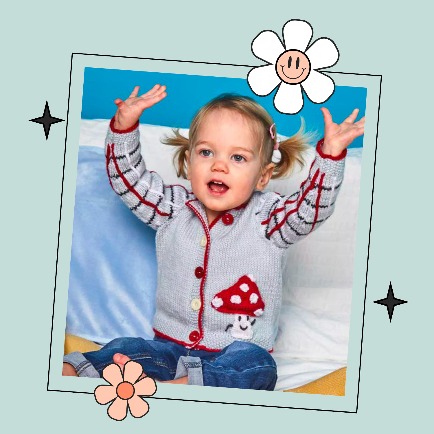 Child wearing a gray sweater with red buttons and a mushroom design, sitting on a couch. Knitted children's cardigan with red trim and mushroom design on a white background, Fun guy Mushroom cardigan knitted pattern for babies with plaid sleeves. jane burns designs