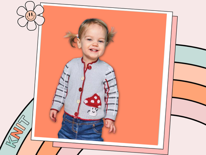 Child wearing a knit cardigan with mushroom design on an orange background Knitted children's cardigan with red trim and mushroom design on a white background, Fun guy Mushroom cardigan knitted pattern for babies with plaid sleeves. jane burns designs