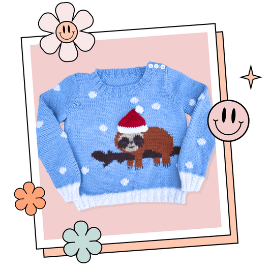 Sleepy Sloth kids Christmas jumper knitting pattern, pale blue with intarsia sloth and removable Santa hat