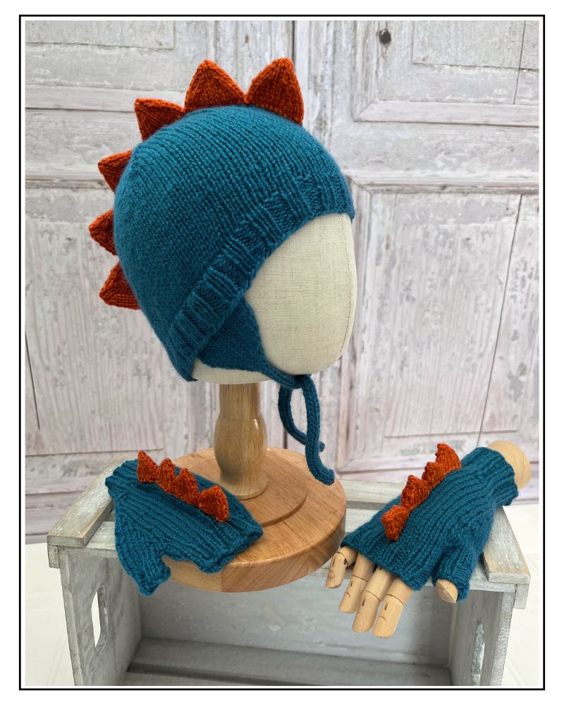 Dinosaur trapper hat and fingerless mittens knitting pattern for children, DK yarn, sizes 1 to 11 years