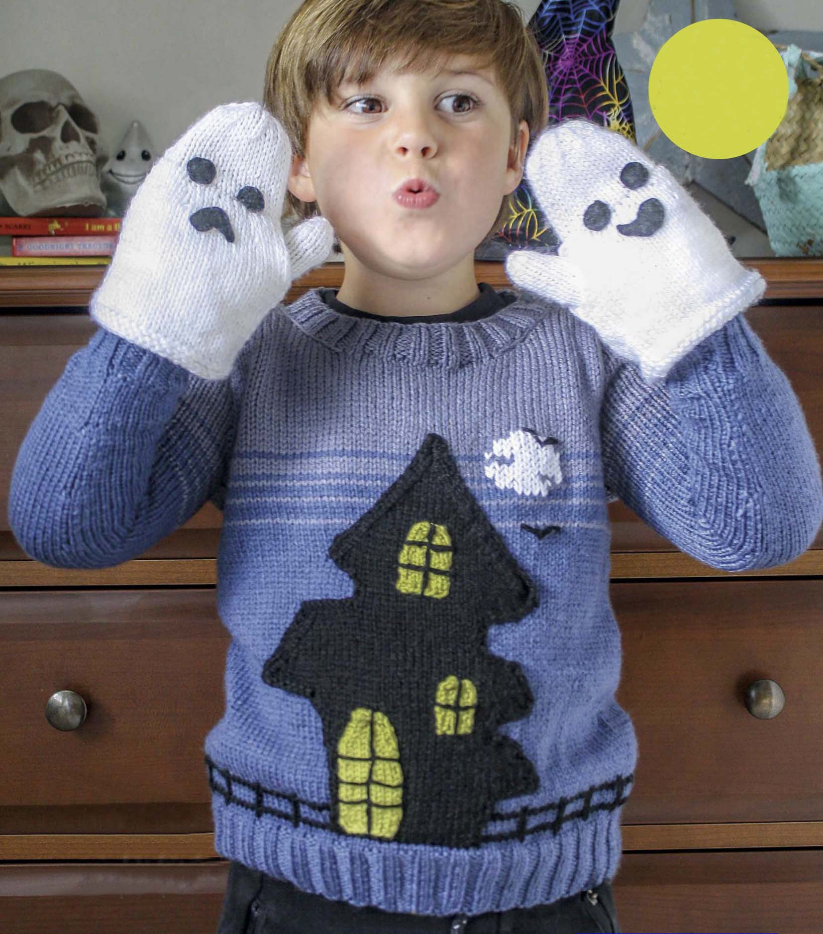 knitting pattern for a blue kids jumper, large black spooky ghost house on the front which has pockets, ghost mittens for child, dk yarn, kids sweater knitting pattern, spooky, halloween, halloween jumper