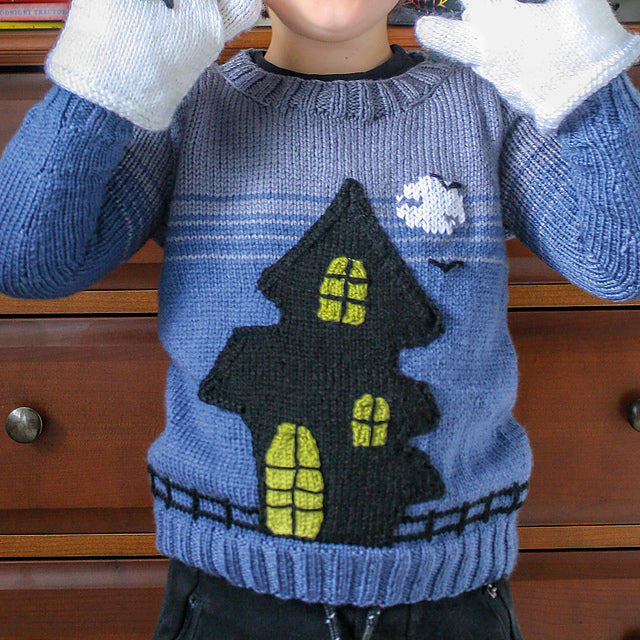 knitting pattern for a blue kids jumper, large black spooky ghost house on the front which has pockets, ghost mittens for child, dk yarn, kids sweater knitting pattern, spooky, halloween, halloween jumper