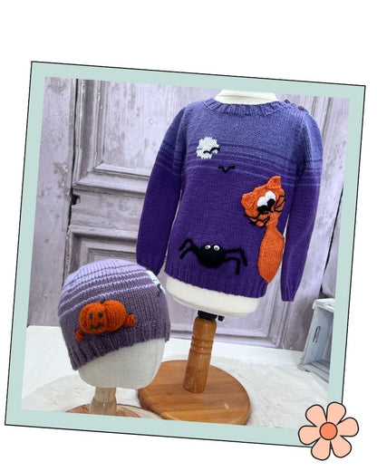 Scaredy Cat Jumper and Pumpkin Halloween Hats collection knitting patterns by Jane Burns.
A purple knit sweater and matching knit beanie displayed on mannequin heads. The sweater has Halloween-themed appliqués including a black spider, orange fox, white moon, and black bat.