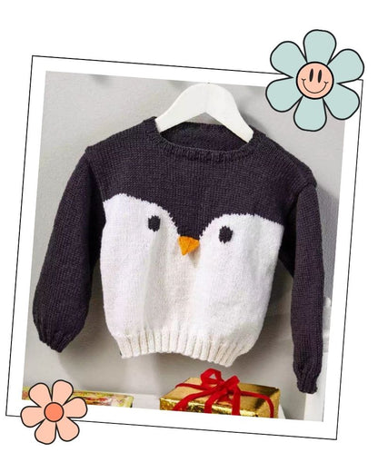 Grey penguin jumper with a white front and orange beak on a hanger, kids jumper knitting pattern in DK