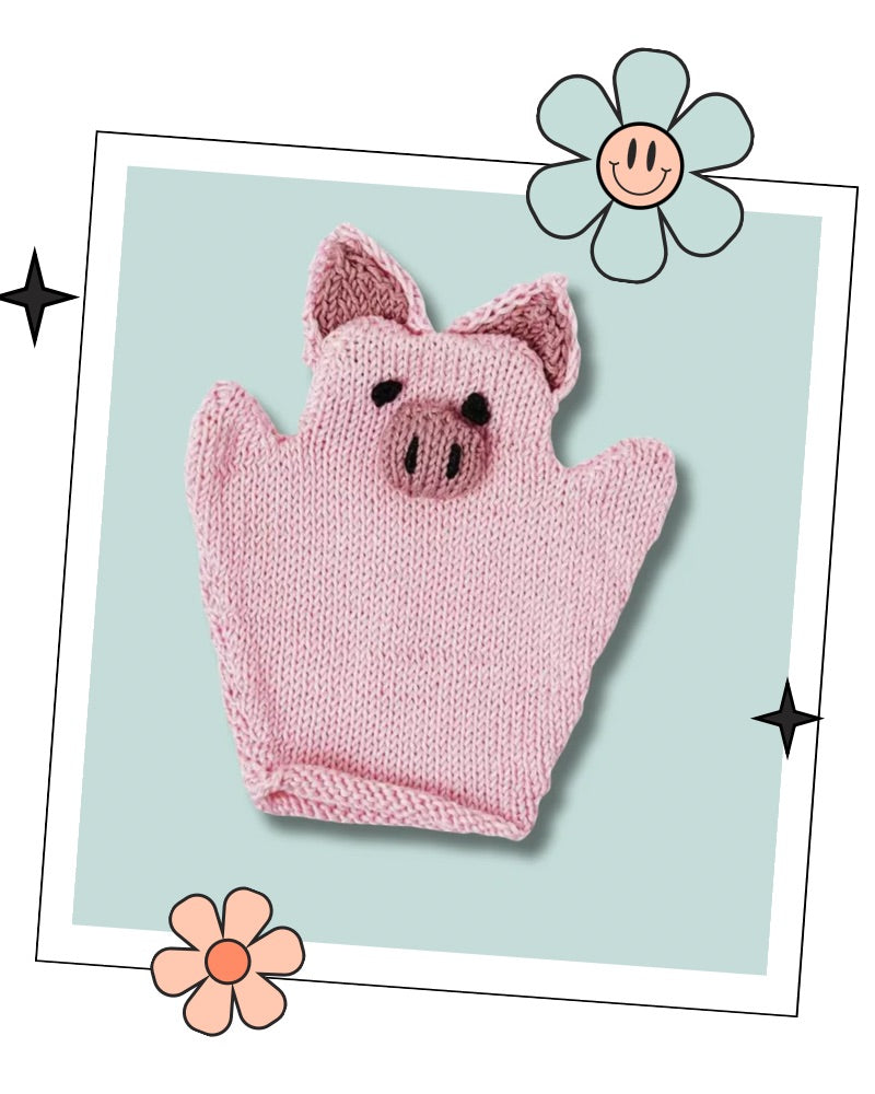 Knitted pig bath mitt with gathered snout and pointed ears, baby bath mitt knitting pattern in pink DK cotton