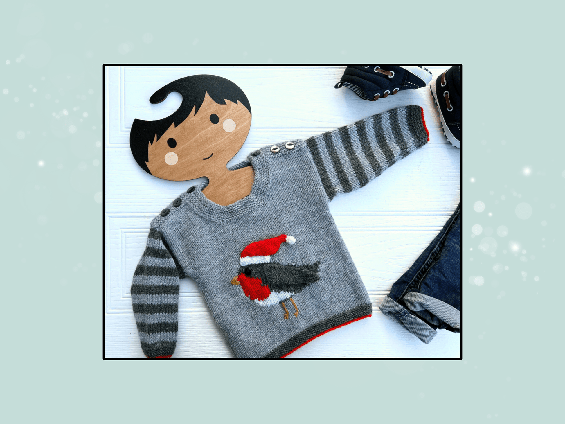 Robin intarsia motif close up, red breast and grey wing, baby Christmas jumper knitting pattern