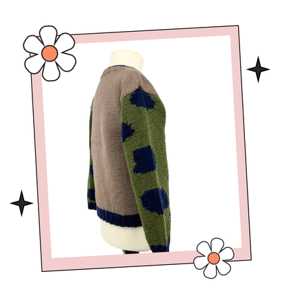 Dinosaur jumper knitting pattern, kids sweater with Dino motif and animal print sleeves. Intarsia knitting pattern for children’s jumper. Jane Burns Designs