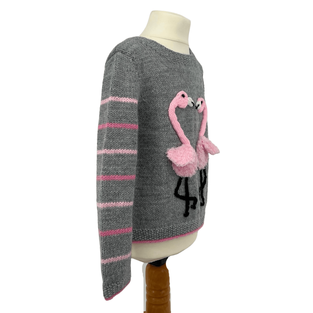 Fluffy Flamingo kids jumper knitting pattern, two applique flamingos forming heart shape, ages 1 to 9