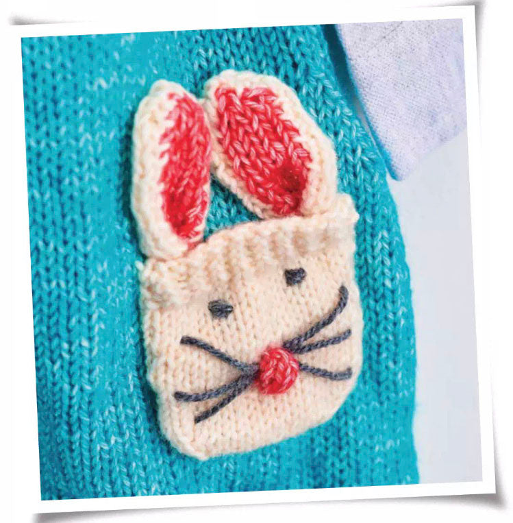 Snowball bunny pants jane burns, baby dungarees romper knitting pattern with rabbit pocket motif