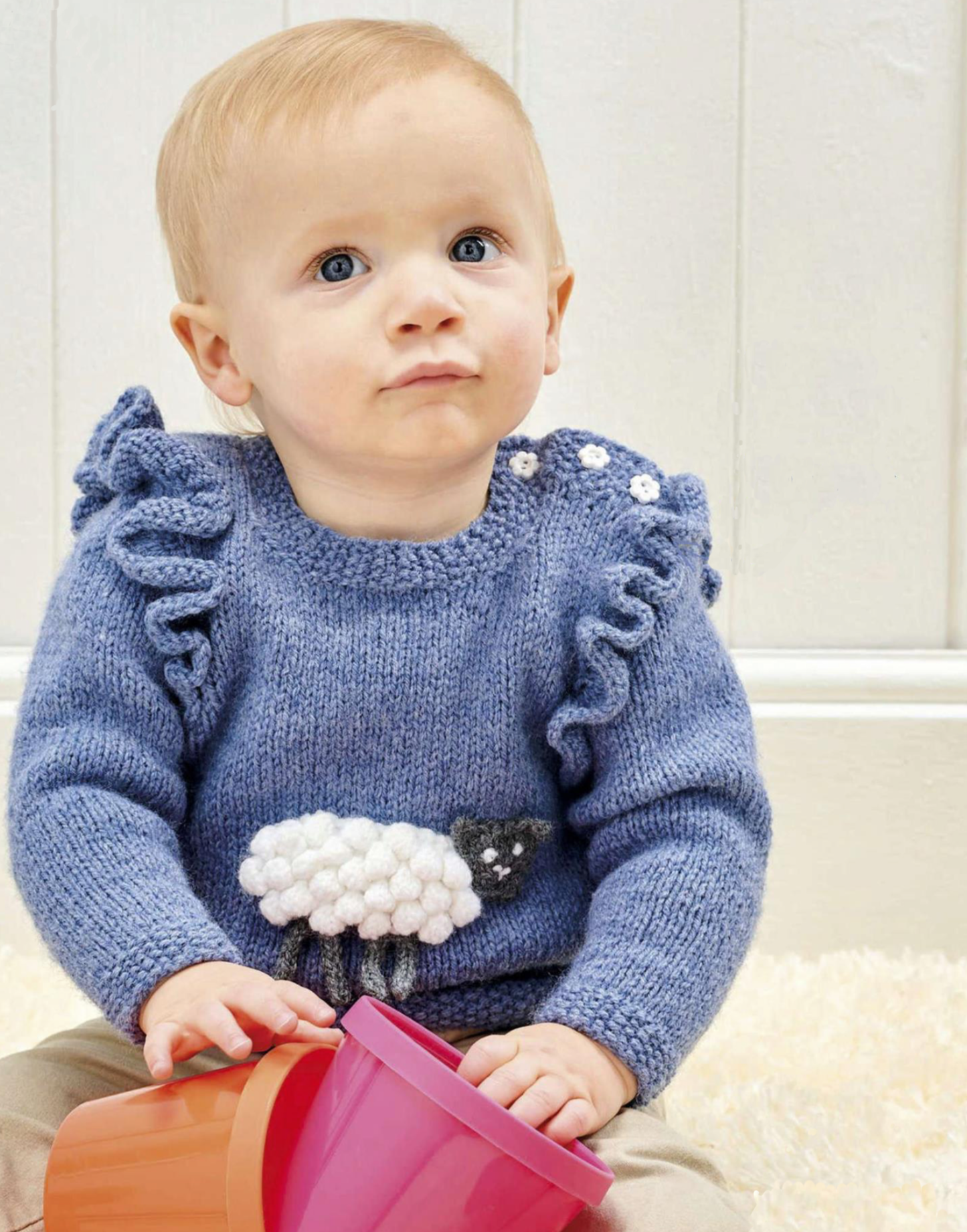 sheep frills, baby lamb frilly jumper knitting pattern jane burns