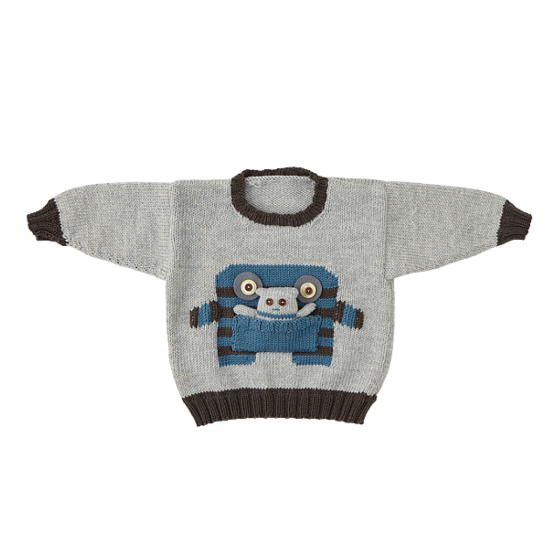 monster motif jumper with large pocket mouth and matching monster toy knitting pattern jane burns