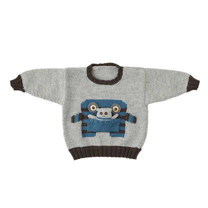 monster motif jumper with large pocket mouth and matching monster toy knitting pattern jane burns