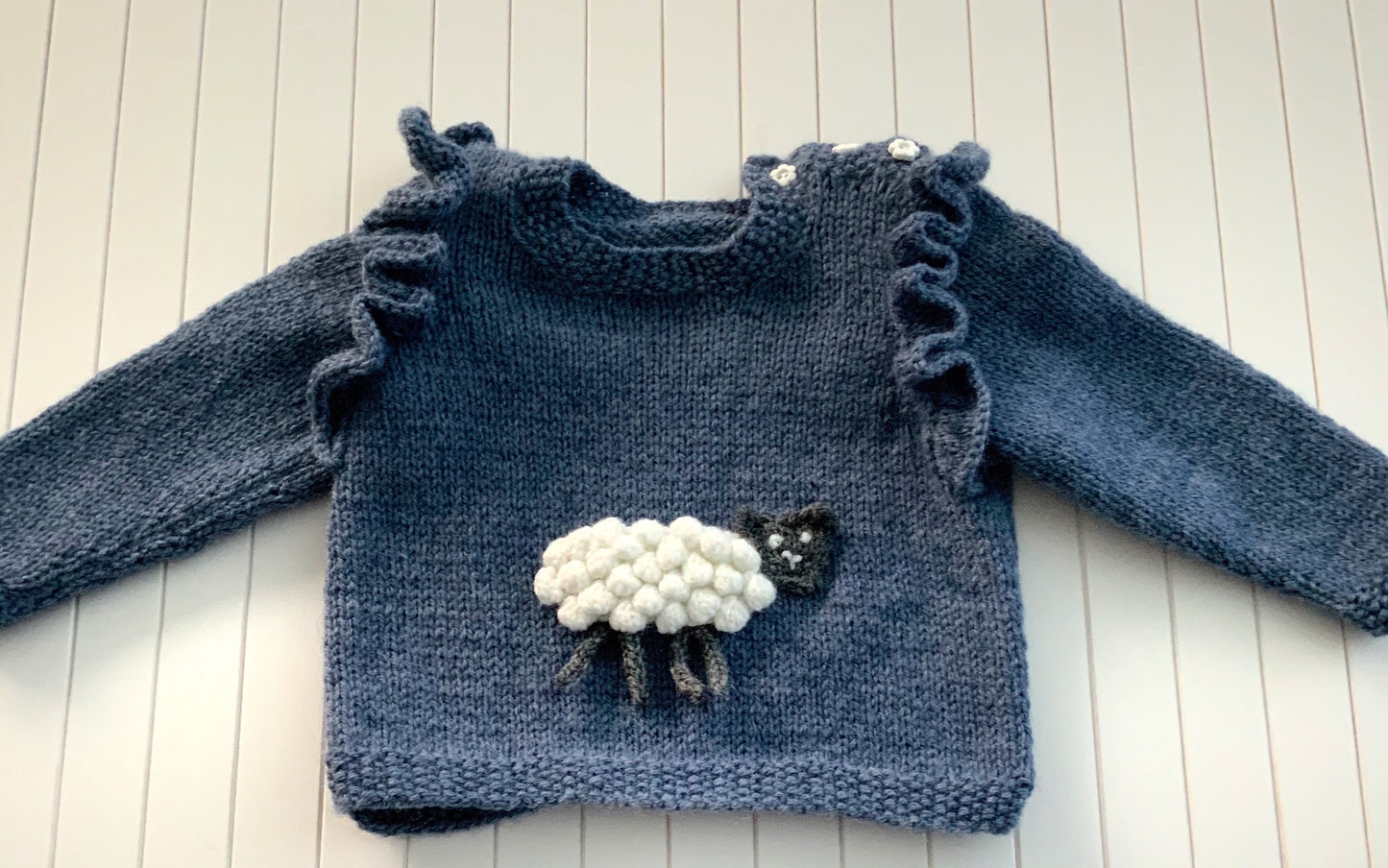 sheep frills, baby lamb frilly jumper knitting pattern jane burns