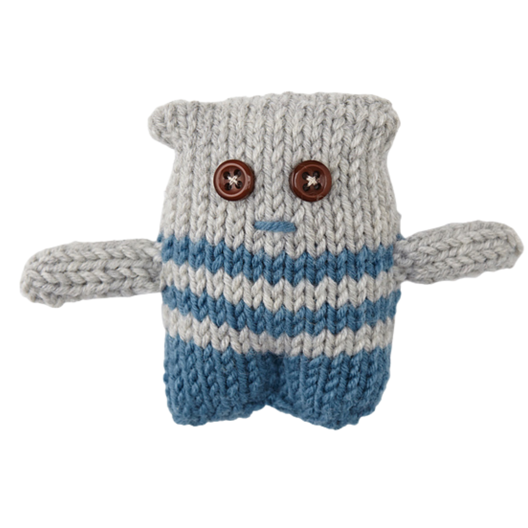 monster motif jumper with large pocket mouth and matching monster toy knitting pattern jane burns